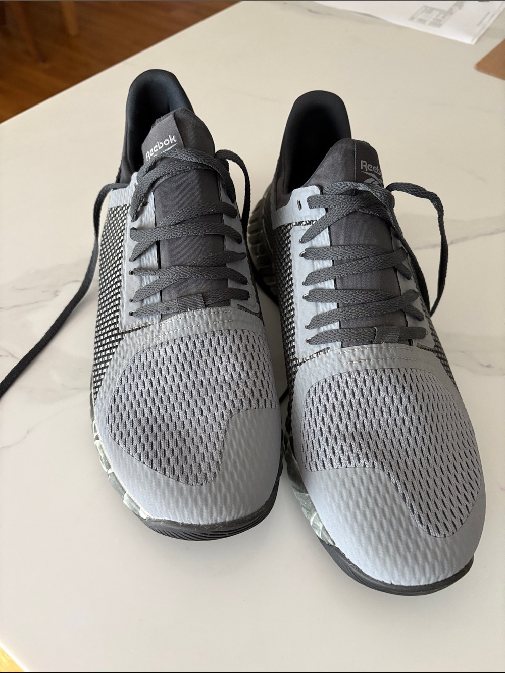 Reebok Men’s Light Gray and Dark Gray Athletic Running Shoes worn once.